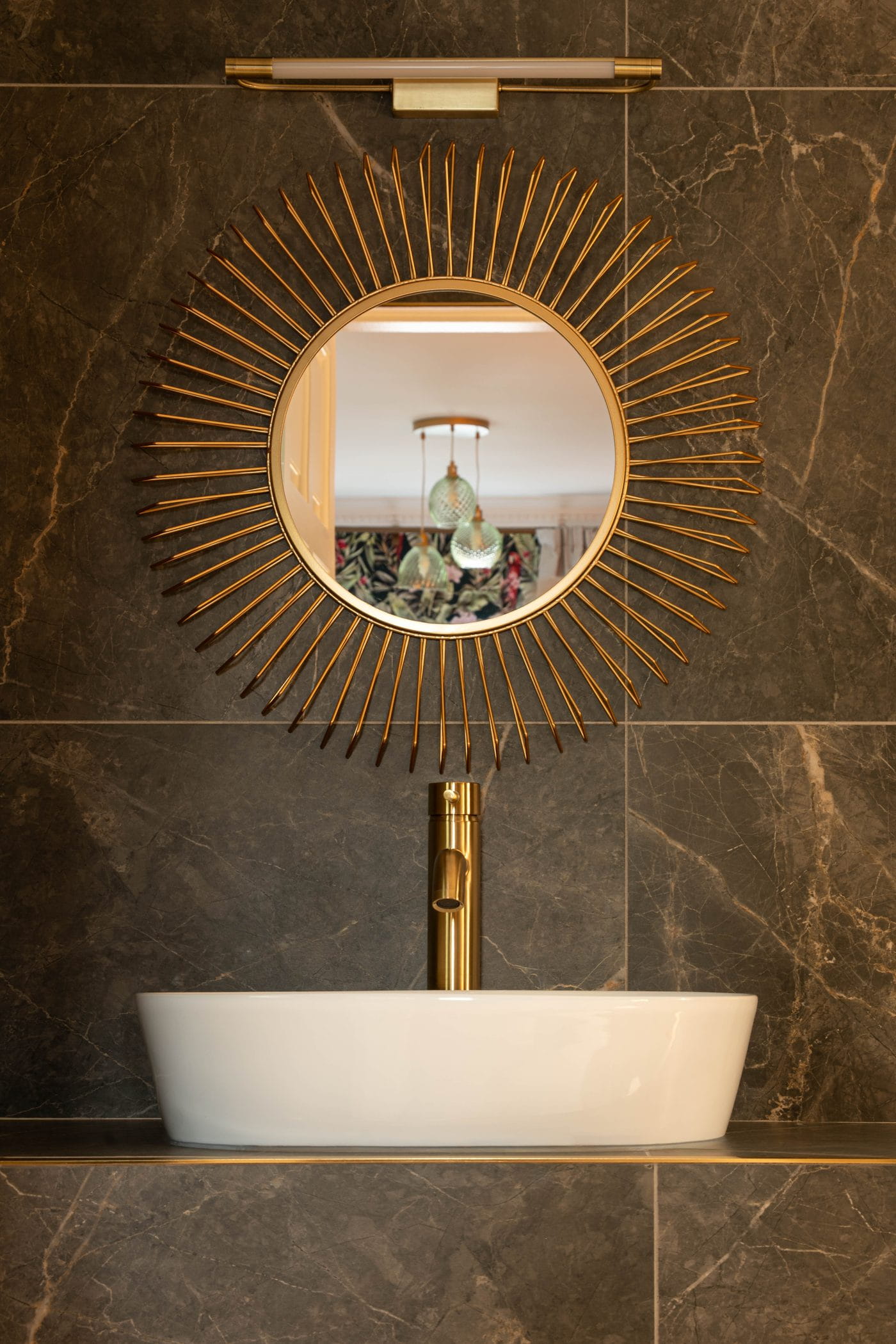 Brass mirror and bathroom details at The Véro Killarney